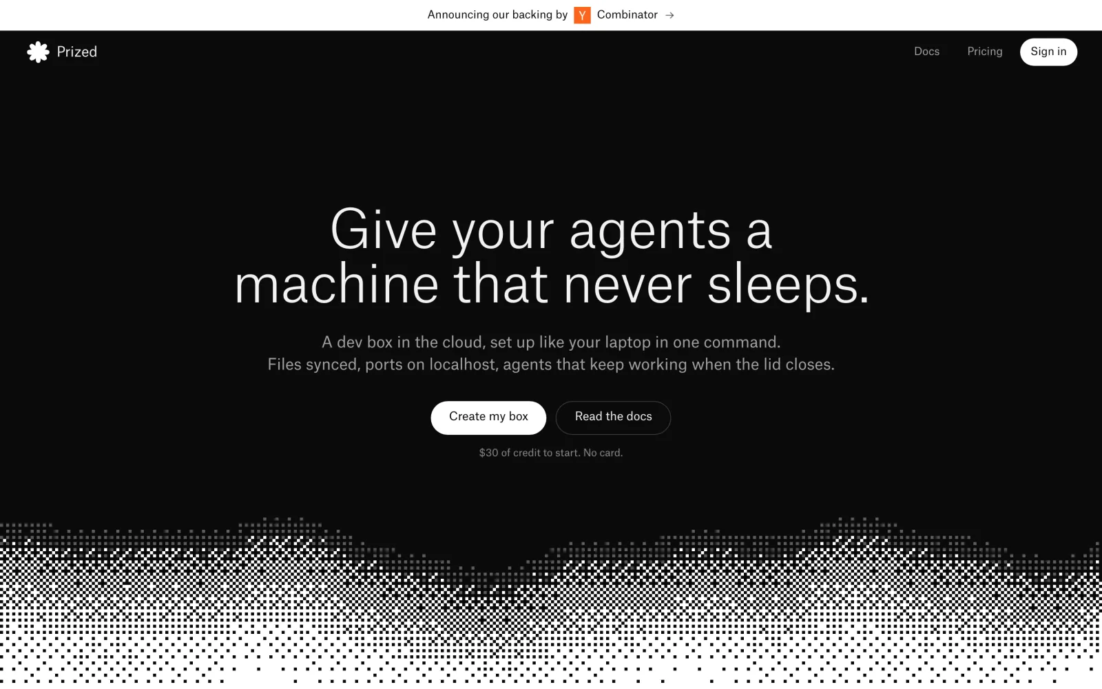 The prized.dev homepage with the headline Give your agents a machine that never sleeps on a black background